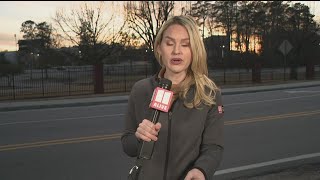 School buses seen carryings kids back to parents after shooting at McEachern