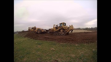 D8R dozer and 621F Scraper moving topsoil