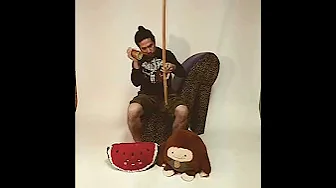 Playing Berimbau