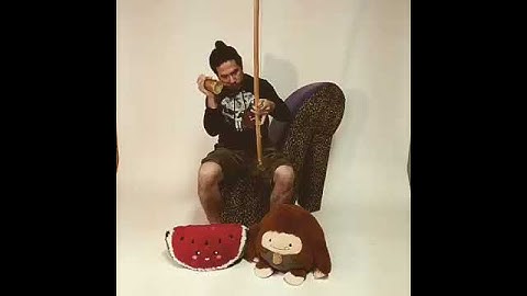 Thumbnail of Playing Berimbau