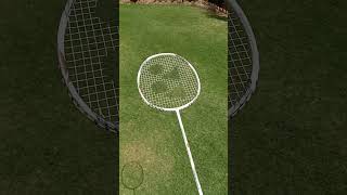 White Yonex badminton racket shorts badminton