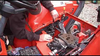 installing rear remotes and spool valve on a kubota - YouTube