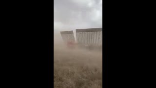 Strong winds from hurricane hanna, which entered south texas,
yesterday knocked down part of the border wall that is under
construction near city reyn...