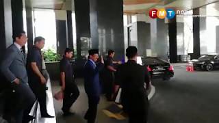 Musa leaving the Sabah Administrative Office building after chairing the first cabinet meeting today