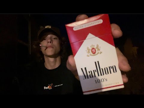 Smoking and reviewing the Marlboro red 100 cigarette