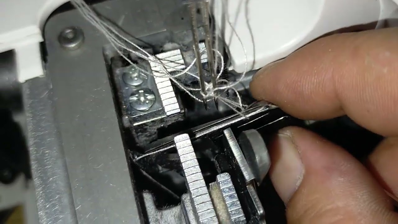 janome 7034D,over, tiempo de los ganchos.