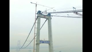 The homemade 1960-MPa super-strength steel cables were put to use on Sunday for the construction of the Nizhou Channel Bridge 