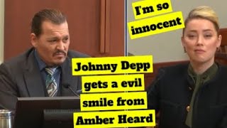 Johnny Depp gets a evil smile from Amber Heard #johnnydepp