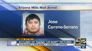 Man accused of taking "up-skirt" photos