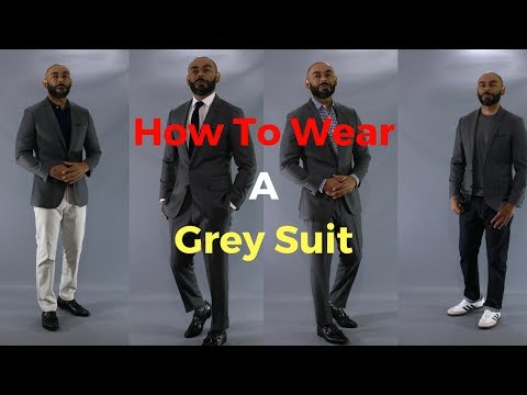 grey suit with black dress
