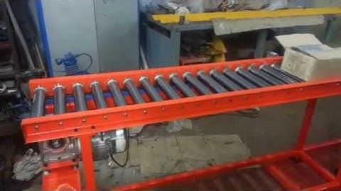 Orange Conveyor Systems - Chain Driven Roller Conveyor