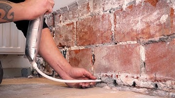 Injecting a wall against rising damp