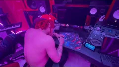 Aiden London Trippie redd signs posters with "finish line" in the background(snippet)