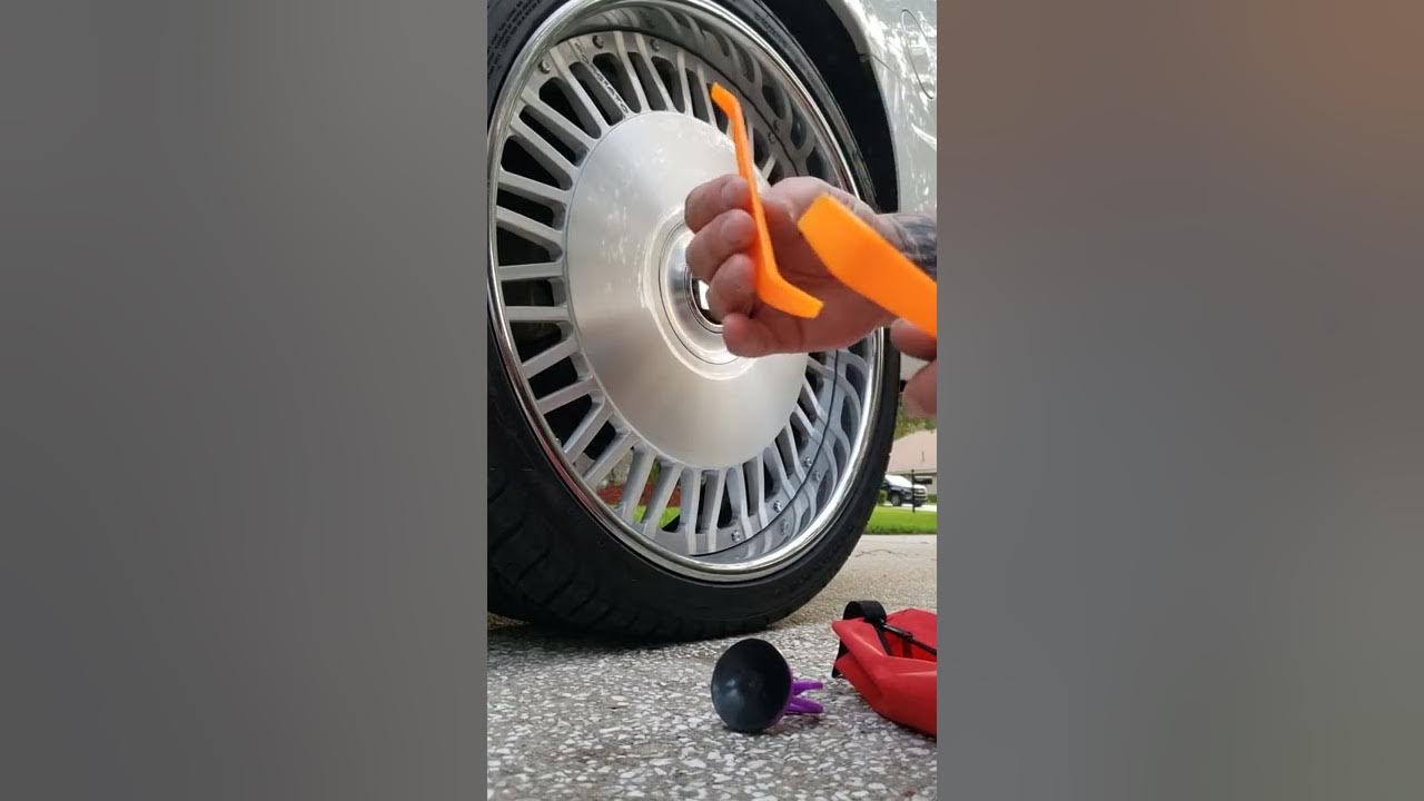 Forgiato XL extra large floating center cap removal - YouTube