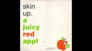 skin up - a juicy red apple