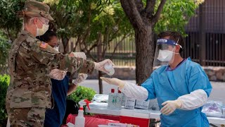 Fears grow over second wave of coronavirus as cases top 2 million in the United States