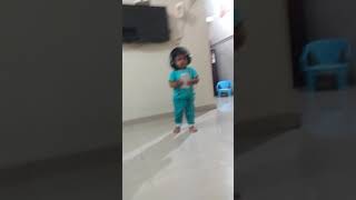 Cute baby dancing with headphone