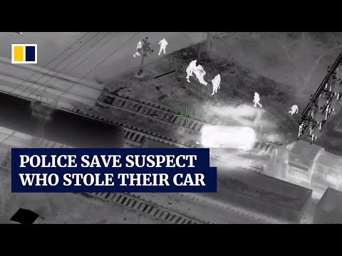 Dramatic moment when us police save suspect who stole a patrol car from an oncoming train