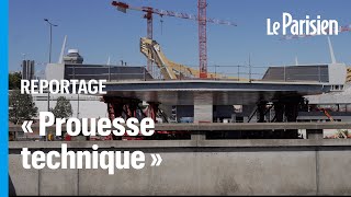 L’impressionnante installation de la passerelle olympique au-dessus de l’A1 à Saint-Denis