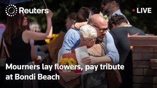 LIVE: Mourners lay flowers and pay tribute at Bondi Beach | REUTERS