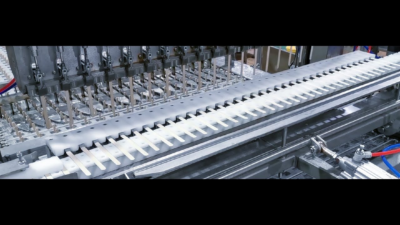 Automatic stick inserter for ice cream stick (popsicle) line - YouTube