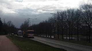 Scania met open pipe bij het kanaal.