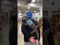 Guy takes his pet dragon into pet store to look for a new leash.