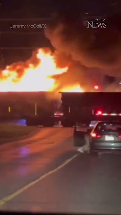 Freight train on fire rolls through downtown London, Ont.