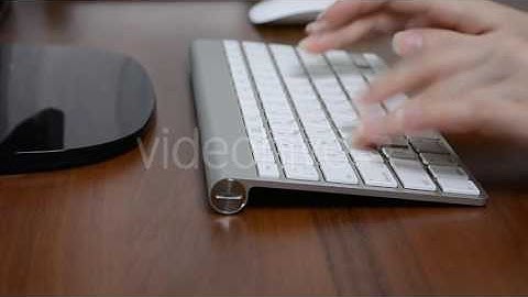 Using a Keyboard on a Dark Table - Stock Footage | VideoHive 15204174
