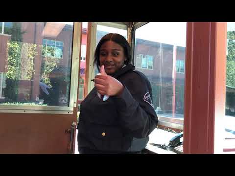 deon cole gives a security guard a ez-scratch.com so she can stop patting her head.