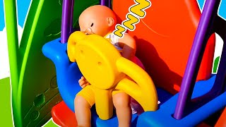 Baby Annabell doll is crying. Baby doll on a playground & a toy slide. Pacifier for baby born doll.