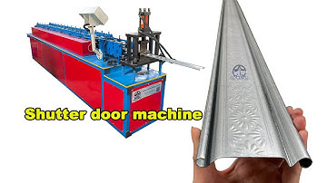 Shutter door roll forming machine working video | rolling shutter door machine | slat machine