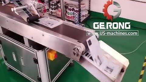 Empty flat plastic bag pouch automatic top labeling machine paging system