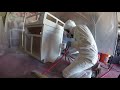 Spraying primer on custom cabinet with husky hvlp gravity spray gun