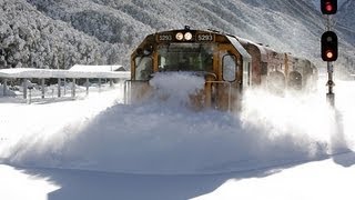 Spectacular footage Train plowing through deep snow  Arthurs Pass
