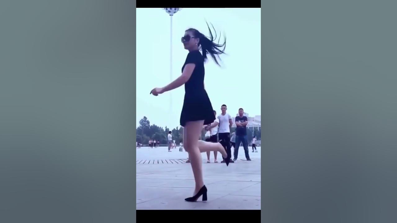 девушка на каблуках танцует шафл. цин цин шафл. цинцин танцовщица шафл. танец шафл цин цин. казашка танцует на площади.