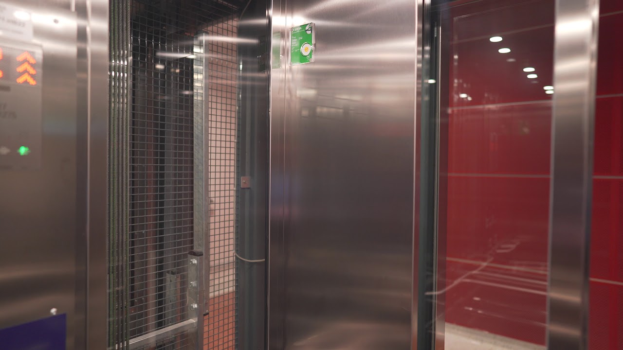 Sweden, Arlanda Airport Terminal 5, Gate 16B-C, KONE elevator - going down to waiting area