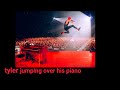 Tyler Joseph jumping over his piano