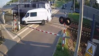 Train collides with van at Polish railway crossing