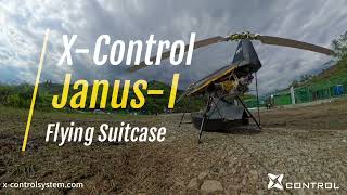 Janus-I Flying Suitcase Ultralight tandem-rotor helicopter flying low over rugged terrain!