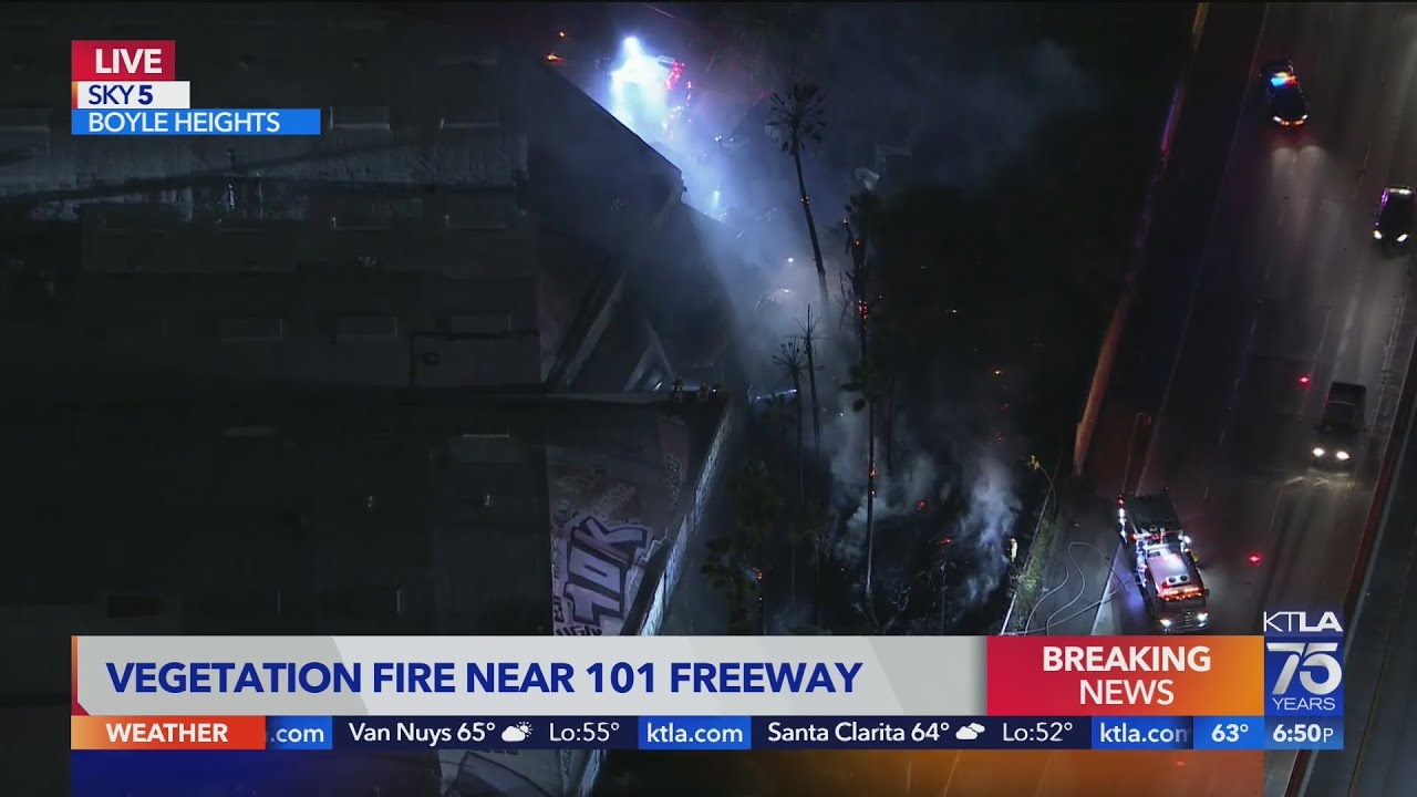 Crews battle brush fire off 101 Freeway - YouTube