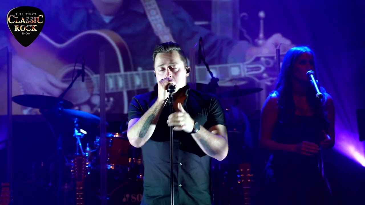 While My Guitar Gently Weeps performed by The Ultimate Classic Rock Show