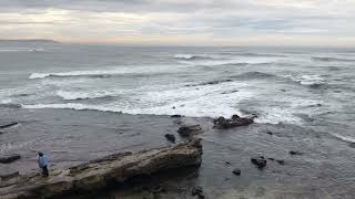 Receding Seawater Exposes Shore at San Diego Beach Amid Tsunami Warning