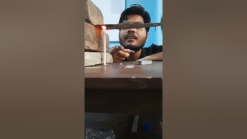 Flow of heat through a metal strip #heat #science #shorts