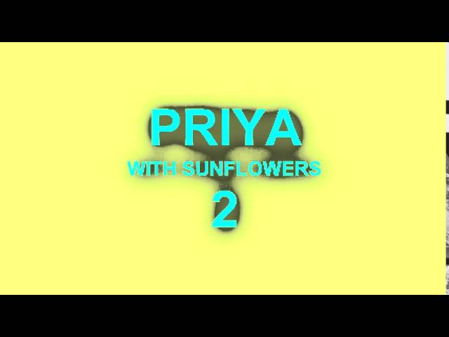PRIYA WITH SUNFLOWERS2 class=