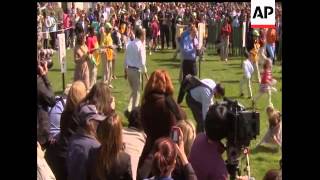 President Barack Obama and his wife Michelle kicked off a sun-splashed Easter Egg Roll at the White