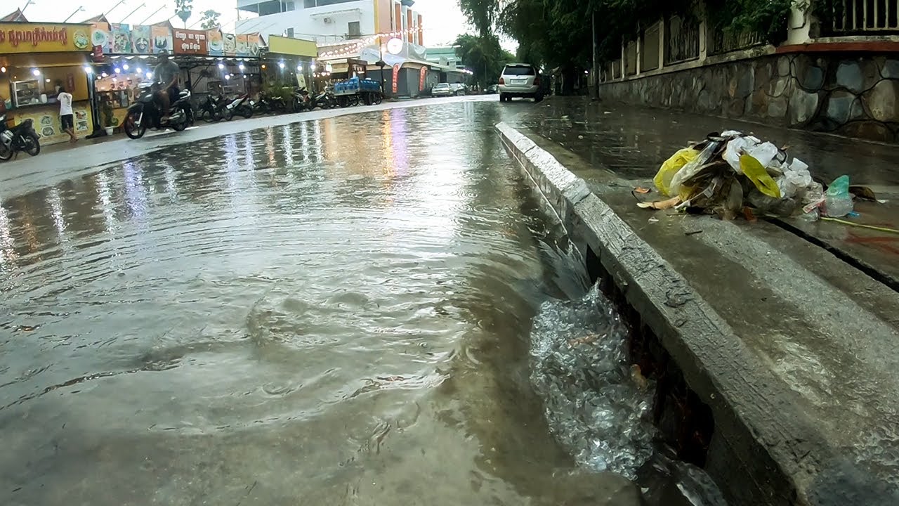 Unclogging Drain Flash Flood On Road After Heavy Rain - YouTube