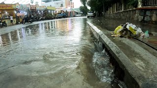 Unclogging Drain Flash Flood On Road After Heavy Rain