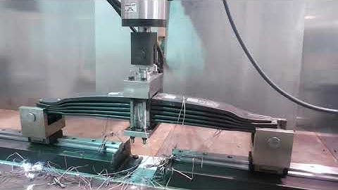 Bending Testing Experimental Setup for Parabolic Leaf Springs