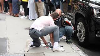 Shia LaBeouf signs autographs for Radioman on the set of Wall Street in New York City
